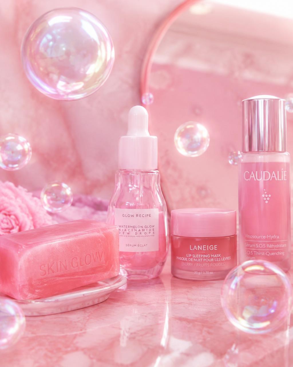 Pink beauty treatment with floating bubbles